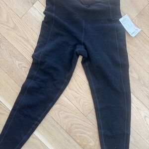 Athleta altitude stash tight in power stretch size medium